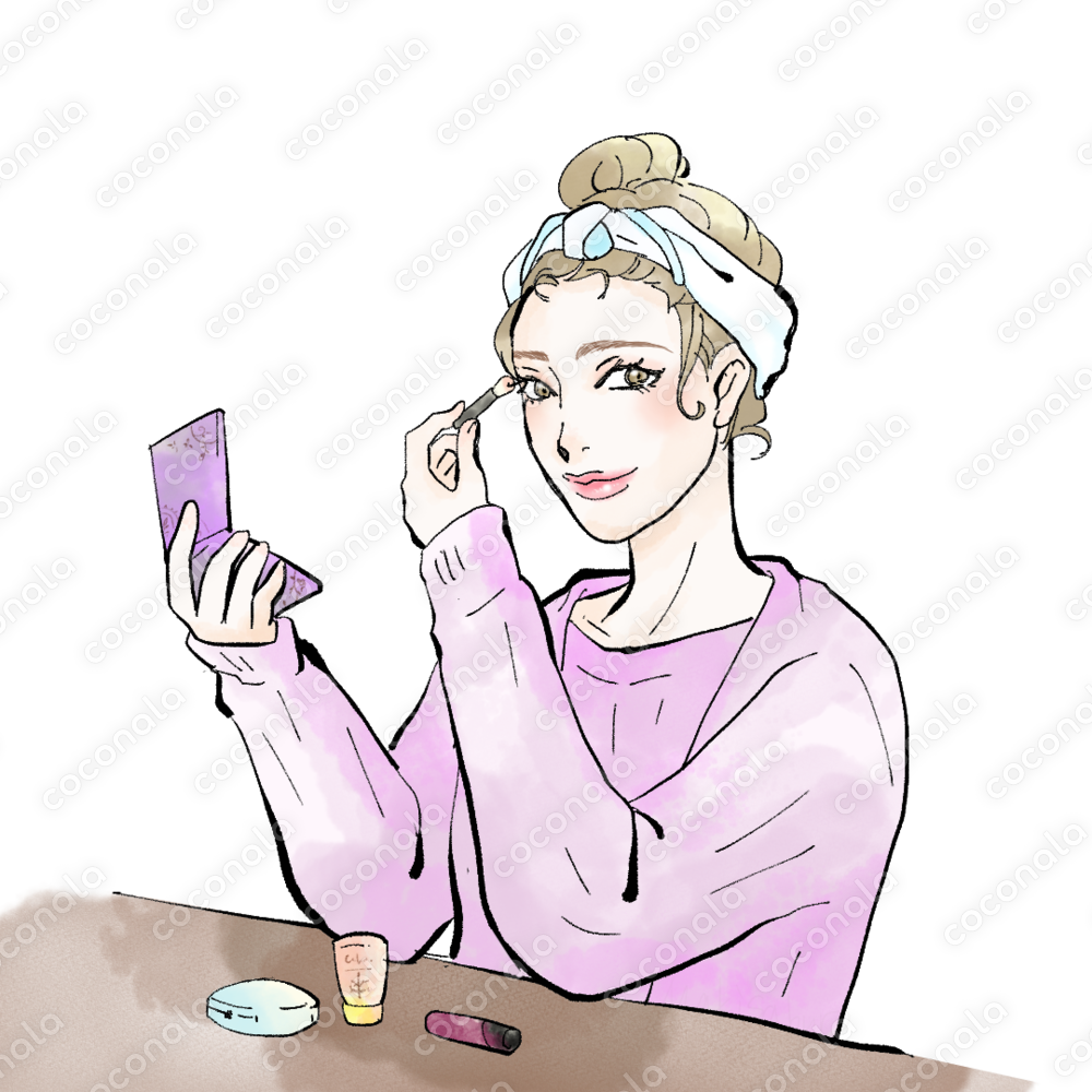 メイクをする女性